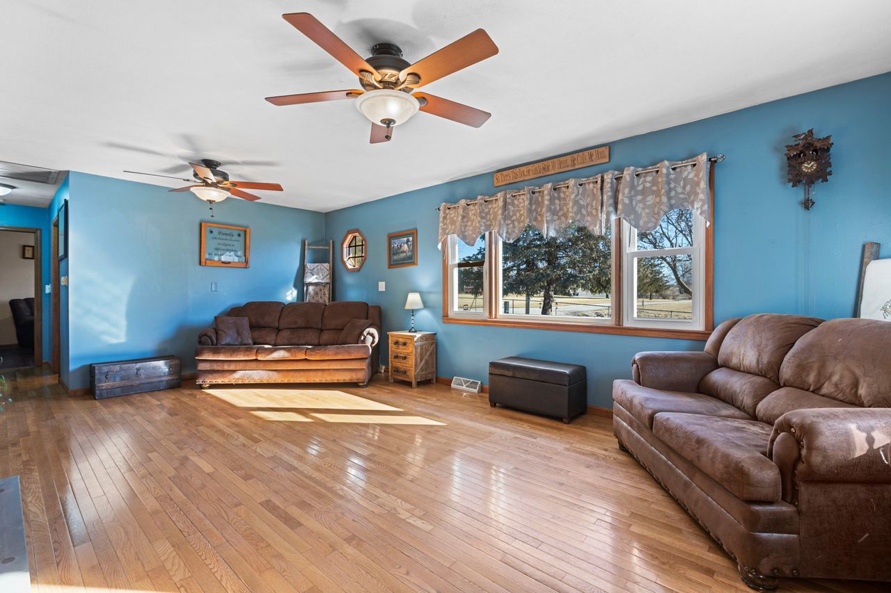 14385 Fennel Road Newark, IL 60541 - Photo 8 of 19 a bedroom with furniture and a large window