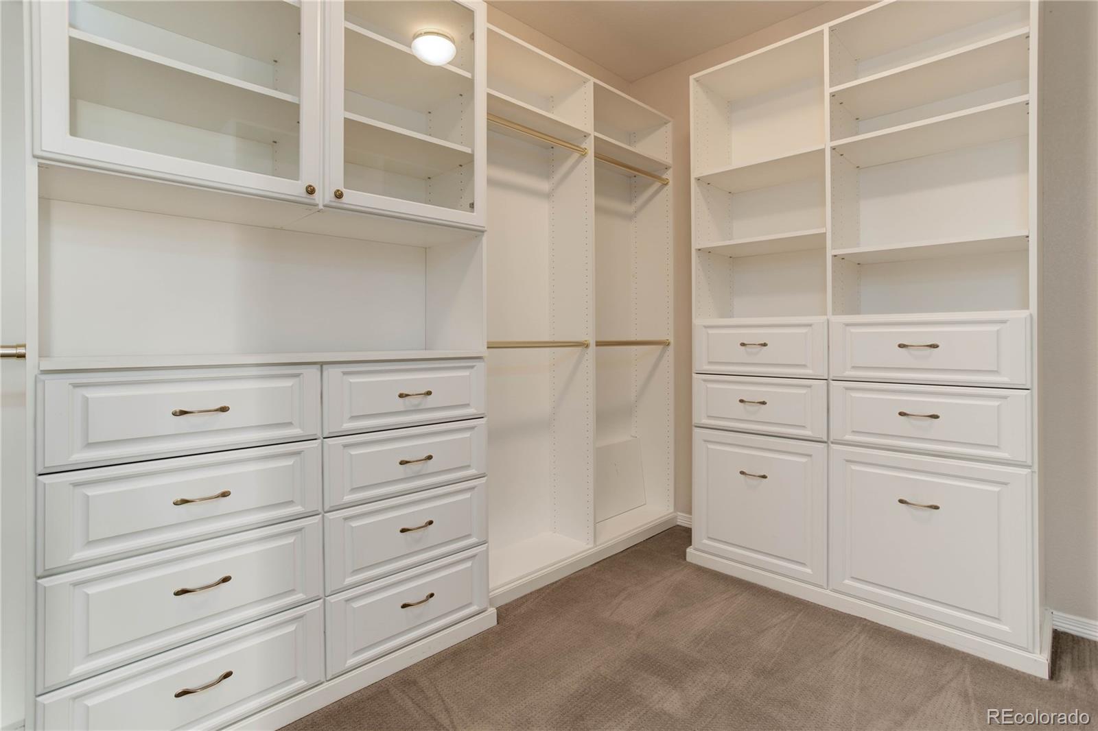 2720 Rockbridge Way Highlands Ranch, CO 80129 - Photo 22 of 39 a view of a dresser