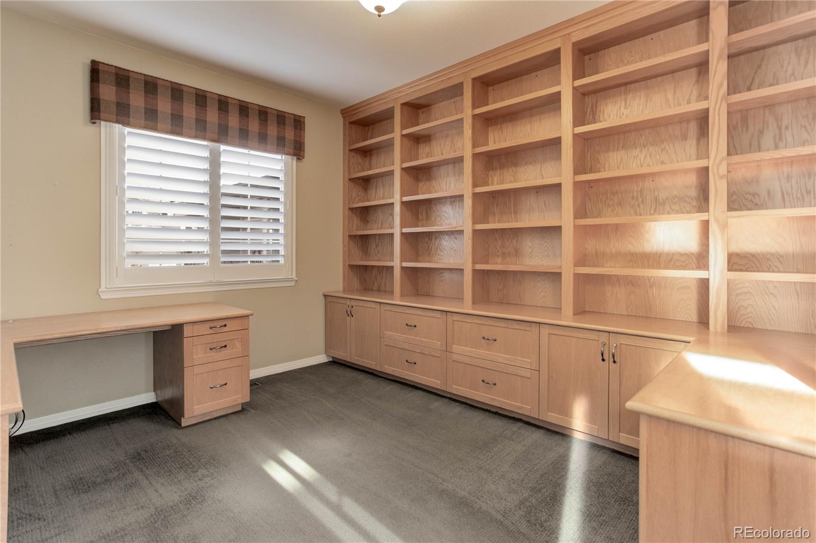 2720 Rockbridge Way Highlands Ranch, CO 80129 - Photo 25 of 39 a view of an empty room with a window