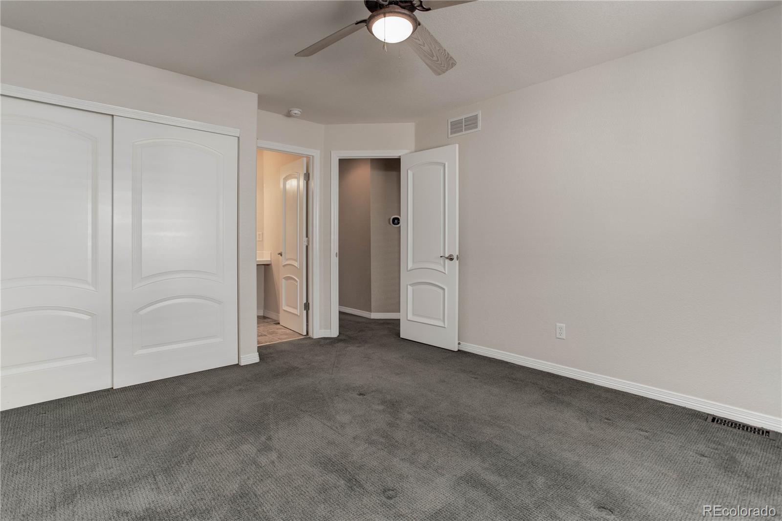 2720 Rockbridge Way Highlands Ranch, CO 80129 - Photo 33 of 39 an empty room with closet area