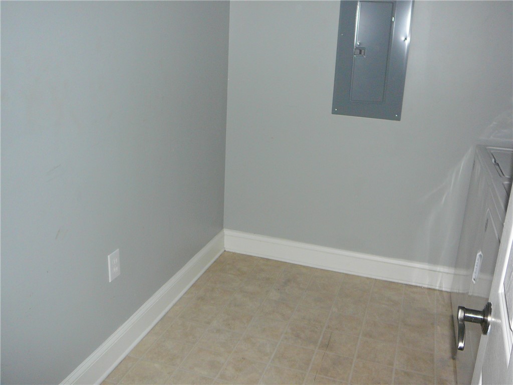 131 Lookover Drive Anderson, SC 29621 - Photo 13 of 18 Functional utility space, complete with a dedicated electric panel and durable tiled flooring.