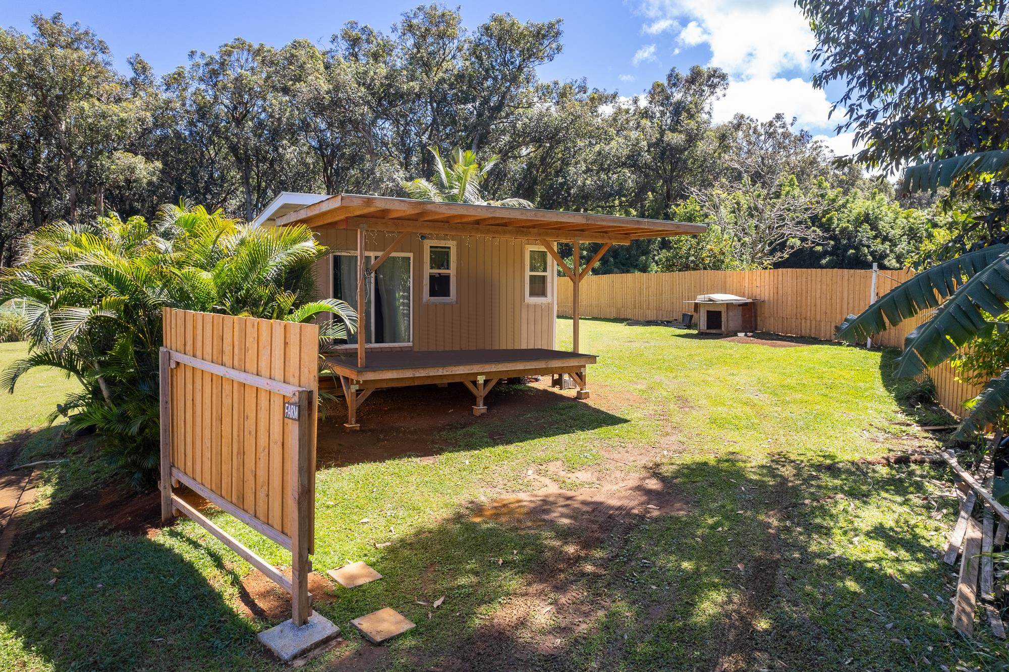 685 Upper Ulumalu Road Haiku, HI 96708 - Photo 21 of 34 a view of a house with backyard and sitting area