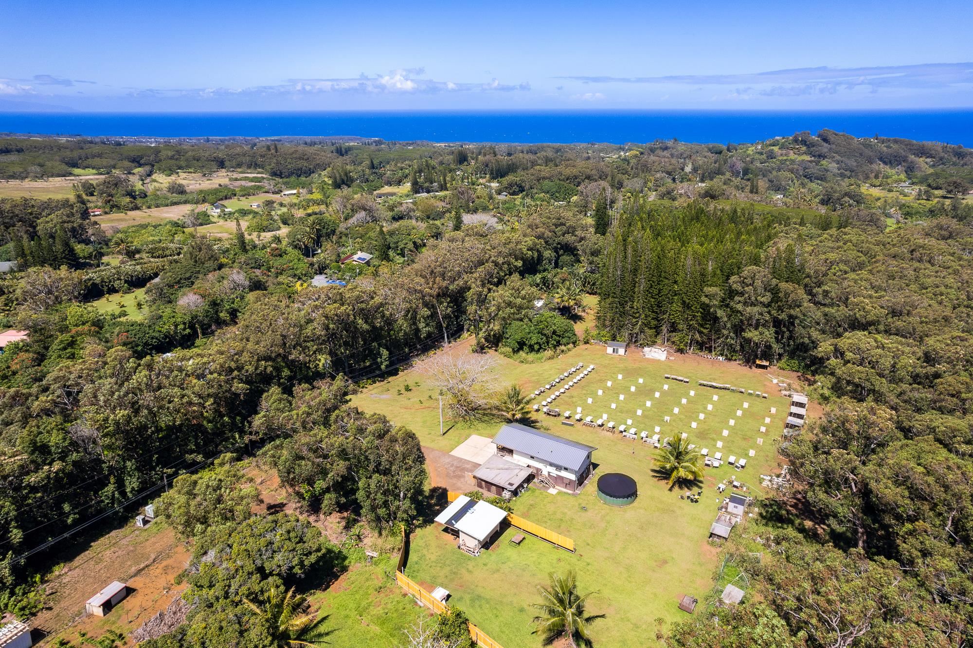685 Upper Ulumalu Road Haiku, HI 96708 - Photo 25 of 34 a view of an outdoor space and mountain view