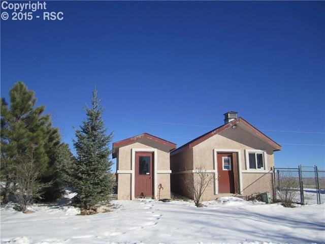 23455 Murphy Road Calhan, CO 80808 - Photo 4 of 5 Front view of butcher shed and workshop with 14 x 26 fenced area for chickens