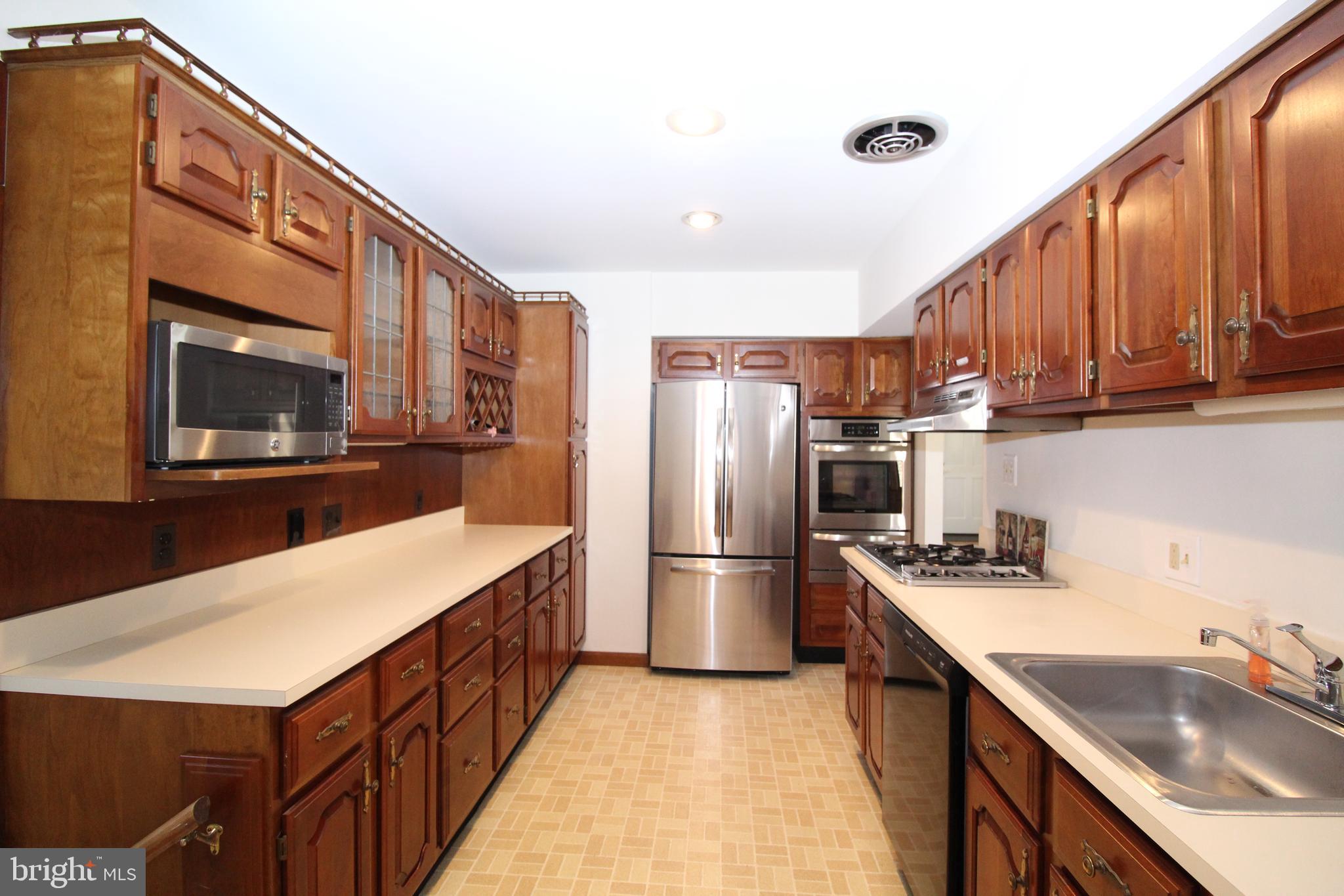 105 Woodwind Road Baltimore, MD 21228 - Photo 14 of 43 Galley Kitchen