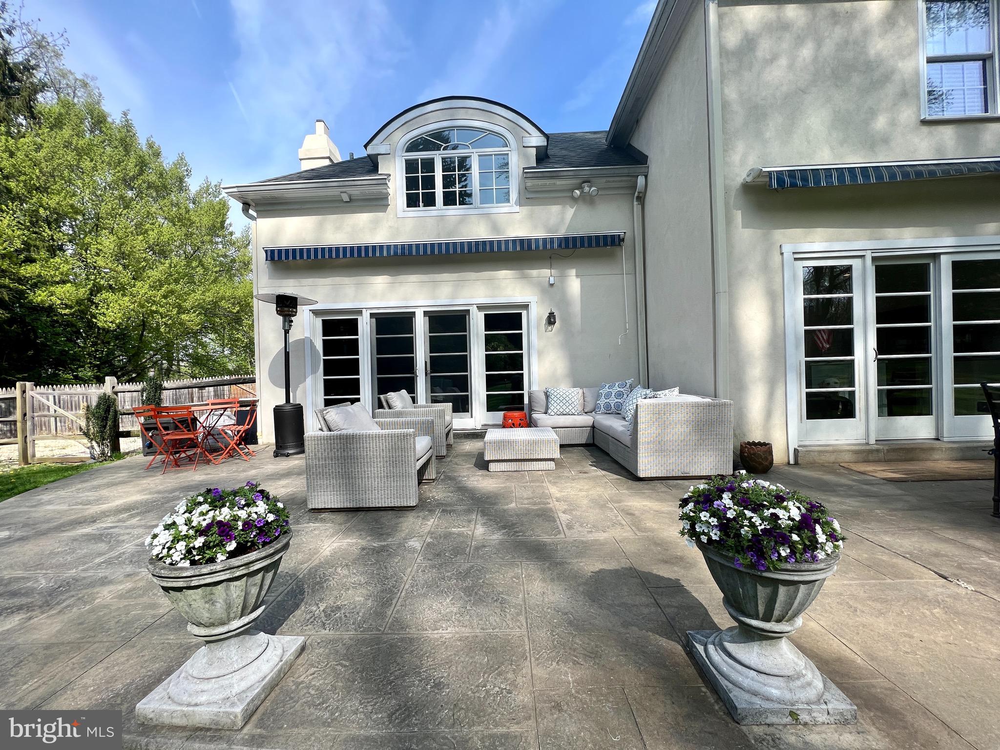 410 North Valley Forge Road Devon, PA 19333 - Photo 16 of 65 rear yard patio - retractable awnings
