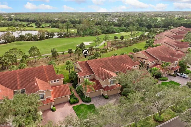 an aerial view of a house with a garden