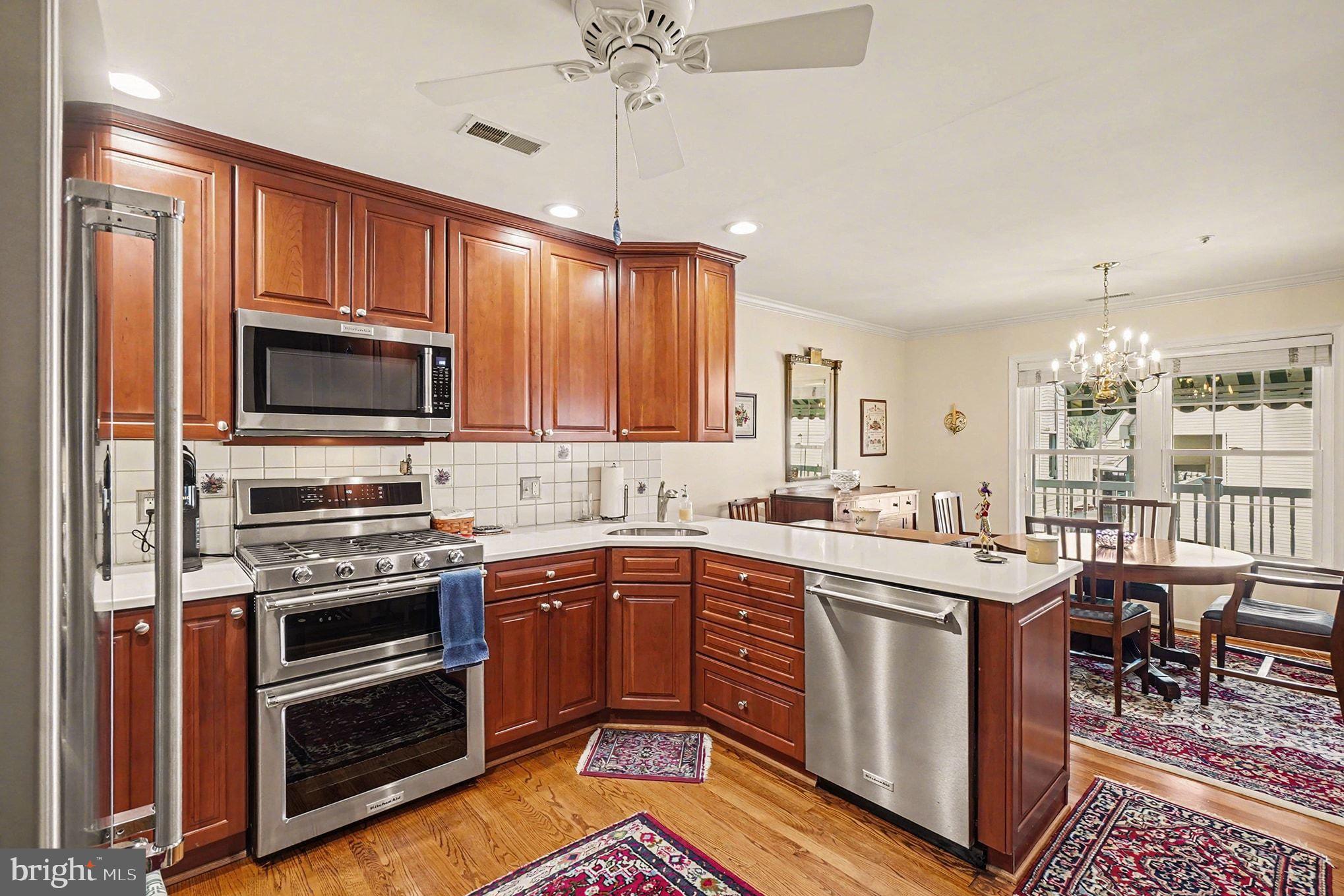 202 Pointe Way, Unit 202B Havre de Grace, MD 21078 - Photo 13 of 72 a kitchen with a sink stove and microwave