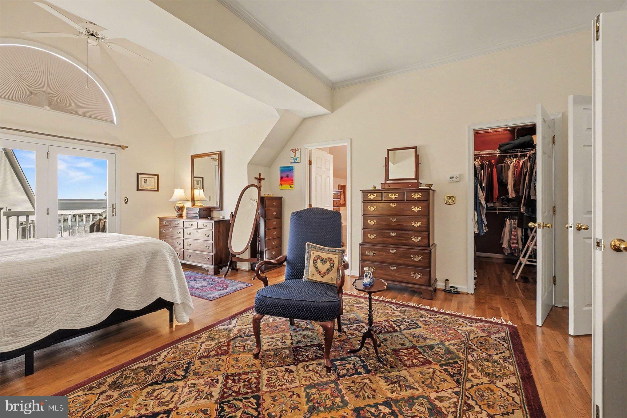 202 Pointe Way, Unit 202B Havre de Grace, MD 21078 - Photo 26 of 72 a bedroom with furniture and a rug