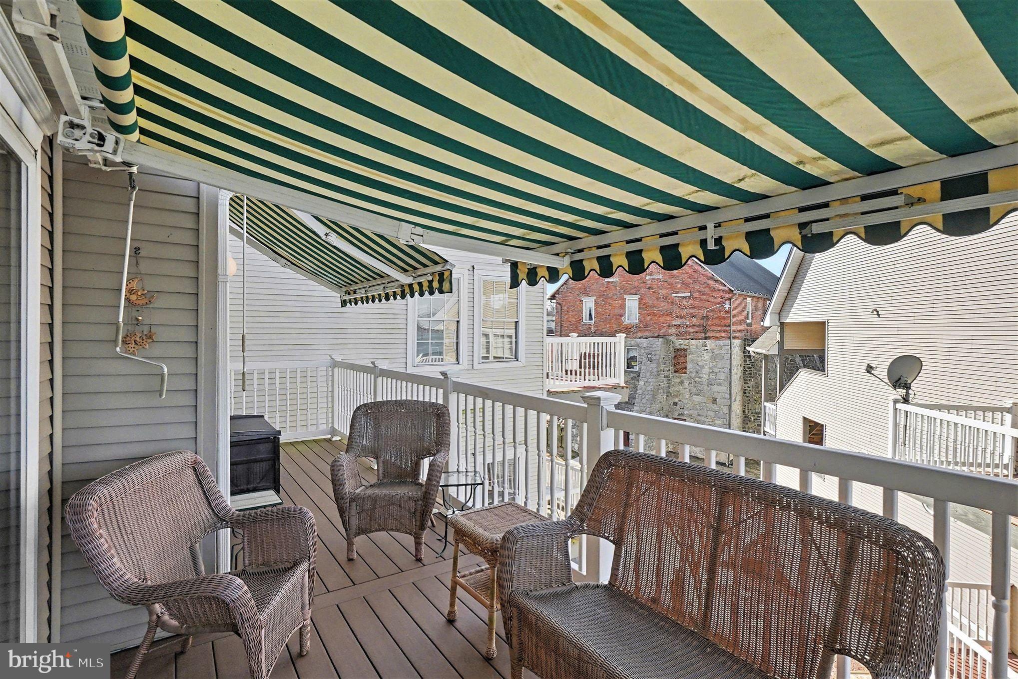202 Pointe Way, Unit 202B Havre de Grace, MD 21078 - Photo 46 of 72 a view of a chair and tables in the balcony