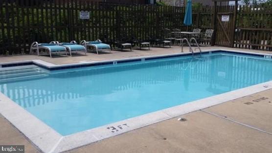 202 Pointe Way, Unit 202B Havre de Grace, MD 21078 - Photo 70 of 72 a view of swimming pool with outdoor seating and outdoor seating