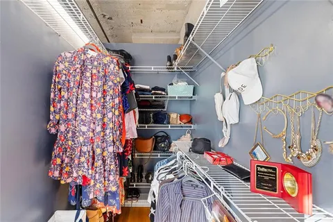 a view of a hallway with washer and dryer