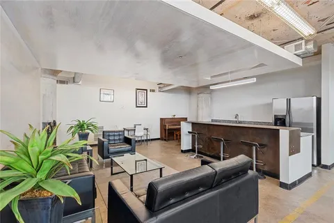 a view of a large building with a swimming pool