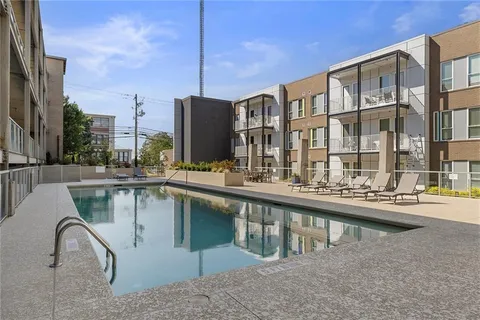 a view of a park with plants and trees
