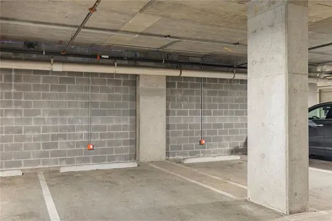 a view of a cafe with sitting area