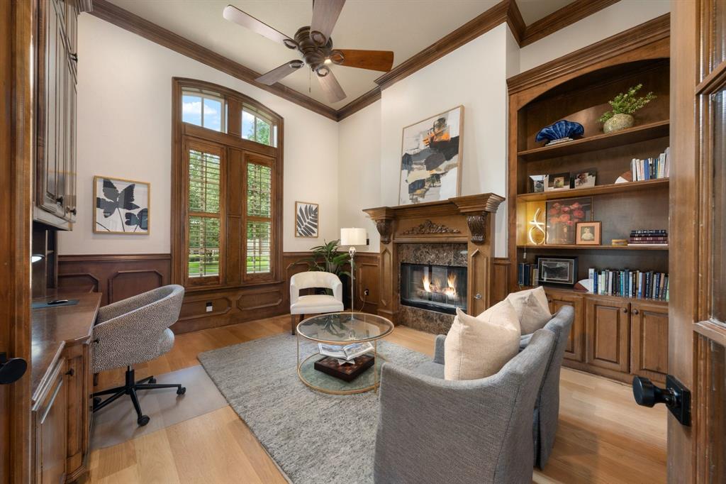 2101 Vail Road Southlake, TX 76092 - Photo 10 of 40 a living room with furniture fireplace and a flat screen tv
