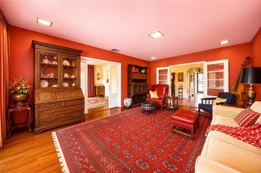 1 Bay Ridge Parkway Brooklyn, NY 11209 - Photo 9 of 38 a living room with furniture a flat screen tv and large window