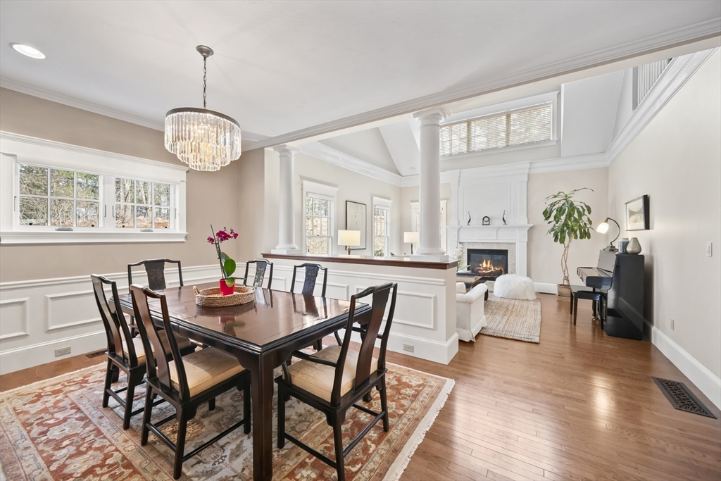 30 Nobscot Road, Unit 1 Sudbury, MA 01776 - Photo 13 of 42 a view of a dining room with furniture window and wooden floor