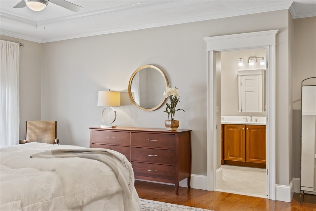 30 Nobscot Road, Unit 1 Sudbury, MA 01776 - Photo 23 of 42 a bedroom with a bed and a dresser