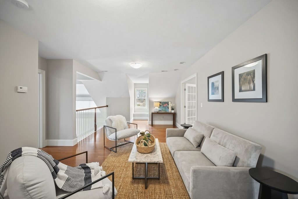 30 Nobscot Road, Unit 1 Sudbury, MA 01776 - Photo 28 of 42 a living room with furniture and a couch