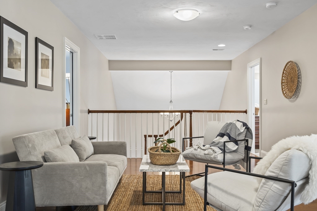 30 Nobscot Road, Unit 1 Sudbury, MA 01776 - Photo 29 of 42 a living room with furniture and a large window