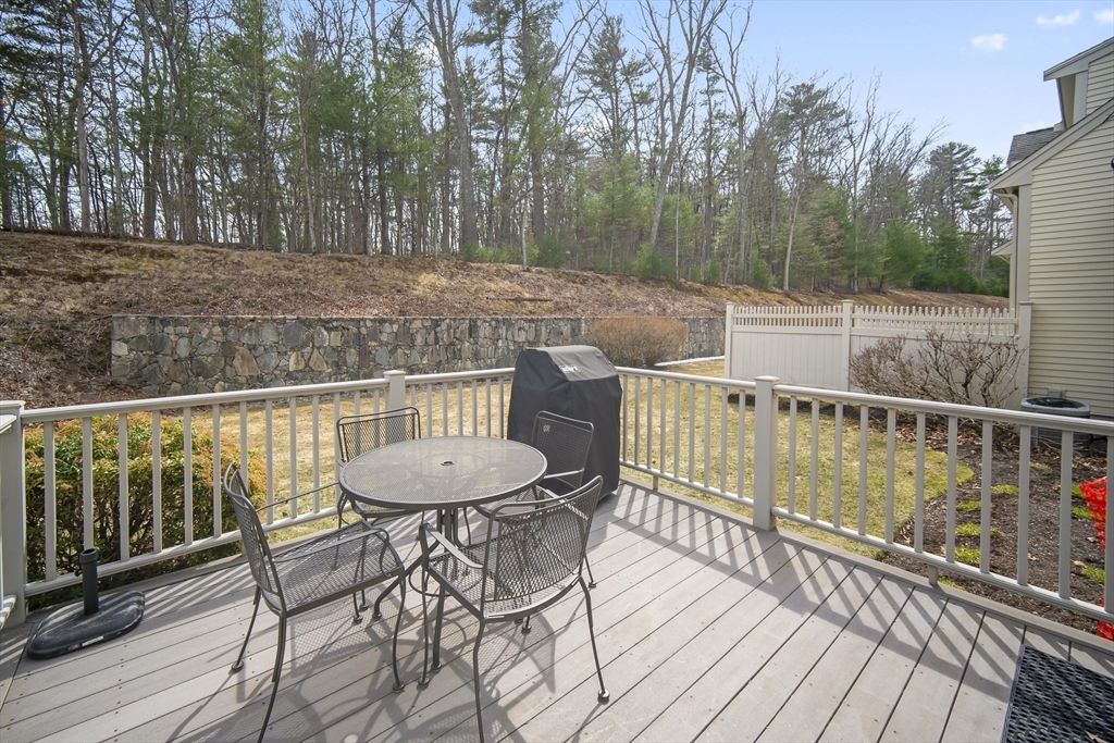 30 Nobscot Road, Unit 1 Sudbury, MA 01776 - Photo 3 of 42 a view of a chairs on the roof deck