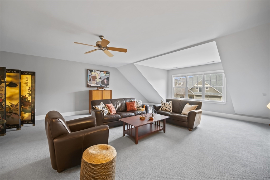 30 Nobscot Road, Unit 1 Sudbury, MA 01776 - Photo 31 of 42 a living room with furniture and a window