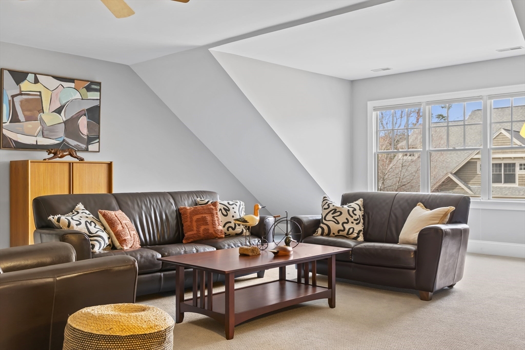 30 Nobscot Road, Unit 1 Sudbury, MA 01776 - Photo 33 of 42 a living room with furniture and a large window