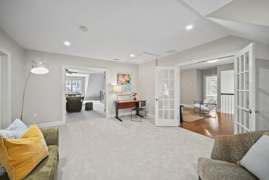 30 Nobscot Road, Unit 1 Sudbury, MA 01776 - Photo 34 of 42 a living room with furniture and a couch