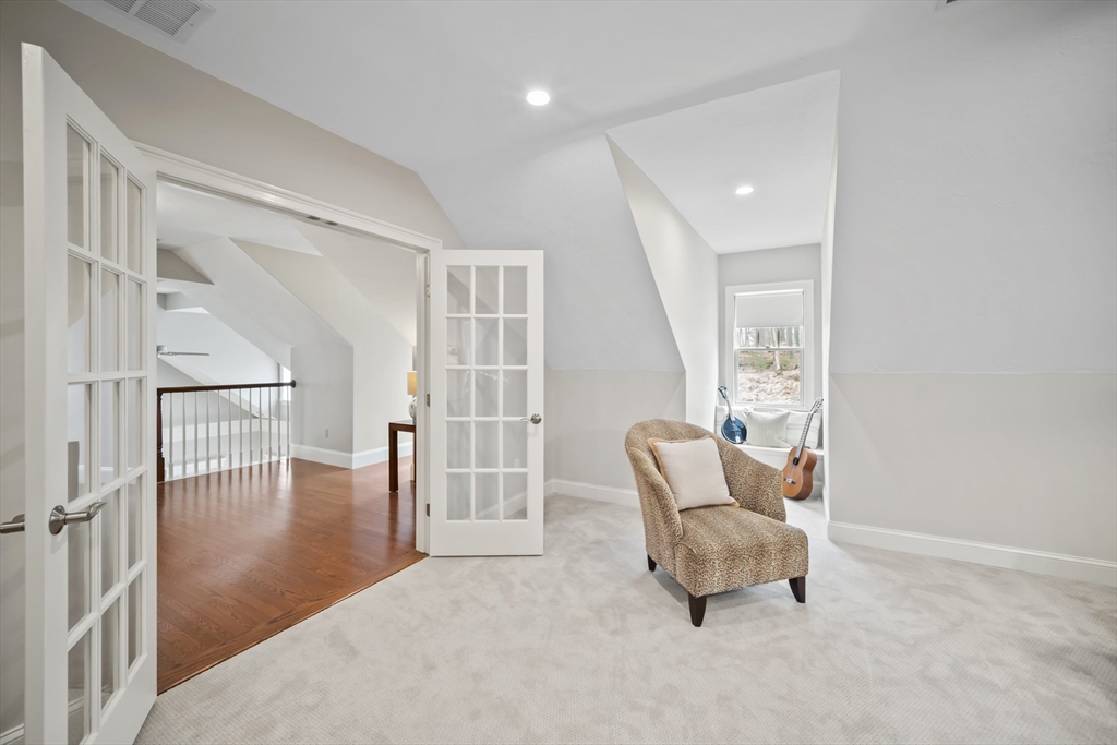 30 Nobscot Road, Unit 1 Sudbury, MA 01776 - Photo 35 of 42 a living room with furniture and a large window