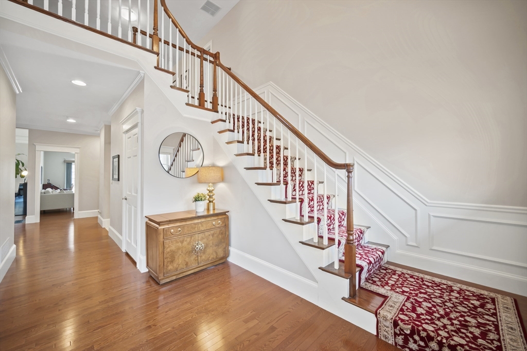 30 Nobscot Road, Unit 1 Sudbury, MA 01776 - Photo 4 of 42 a view of entryway and hall with wooden floor
