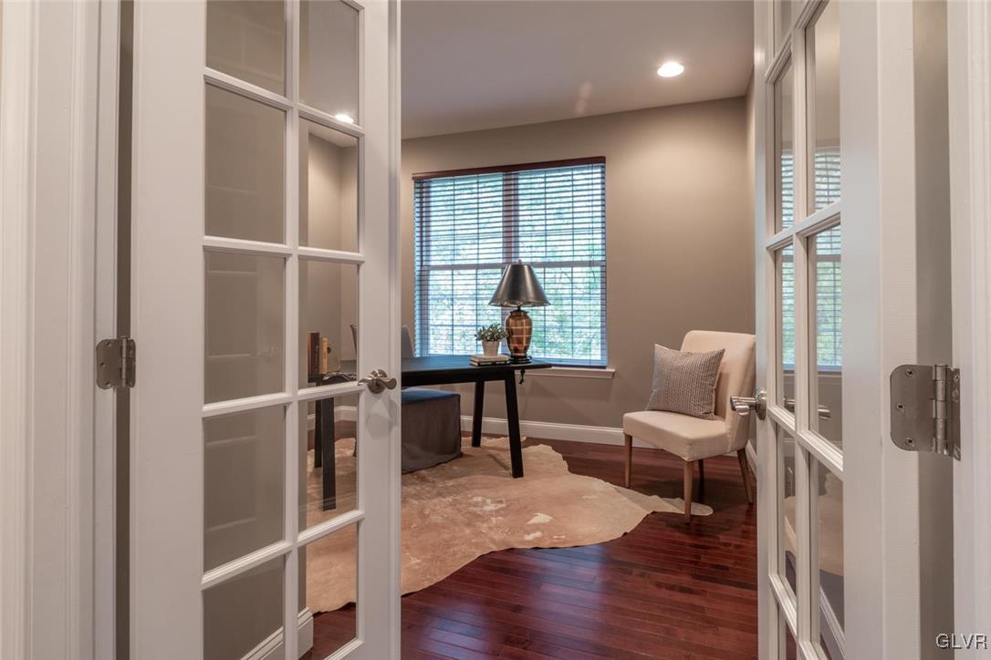 3153 Olympic Drive Emmaus, PA 18049 - Photo 22 of 40 a living room with furniture and a window