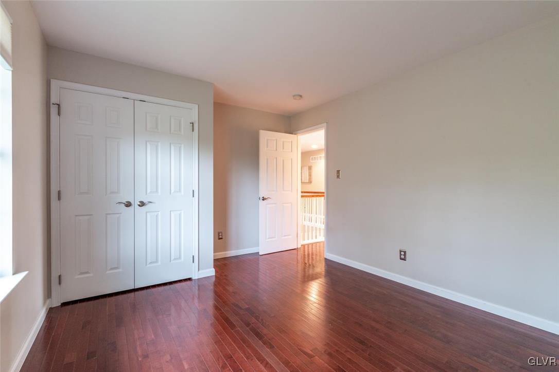 3153 Olympic Drive Emmaus, PA 18049 - Photo 26 of 40 a view of an empty room with wooden floor
