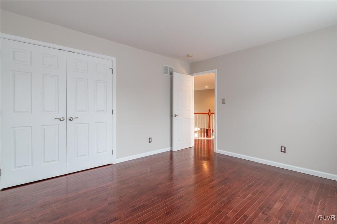 3153 Olympic Drive Emmaus, PA 18049 - Photo 29 of 40 a view of empty room with wooden floor