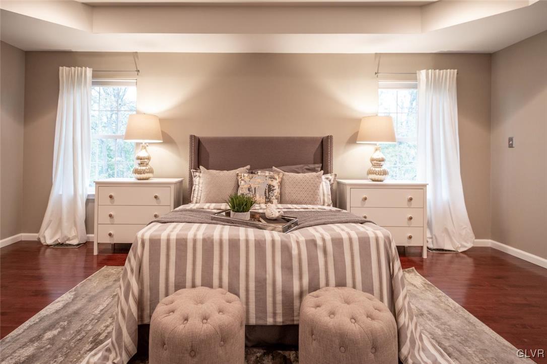 3153 Olympic Drive Emmaus, PA 18049 - Photo 31 of 40 a bedroom with a bed and wooden floor