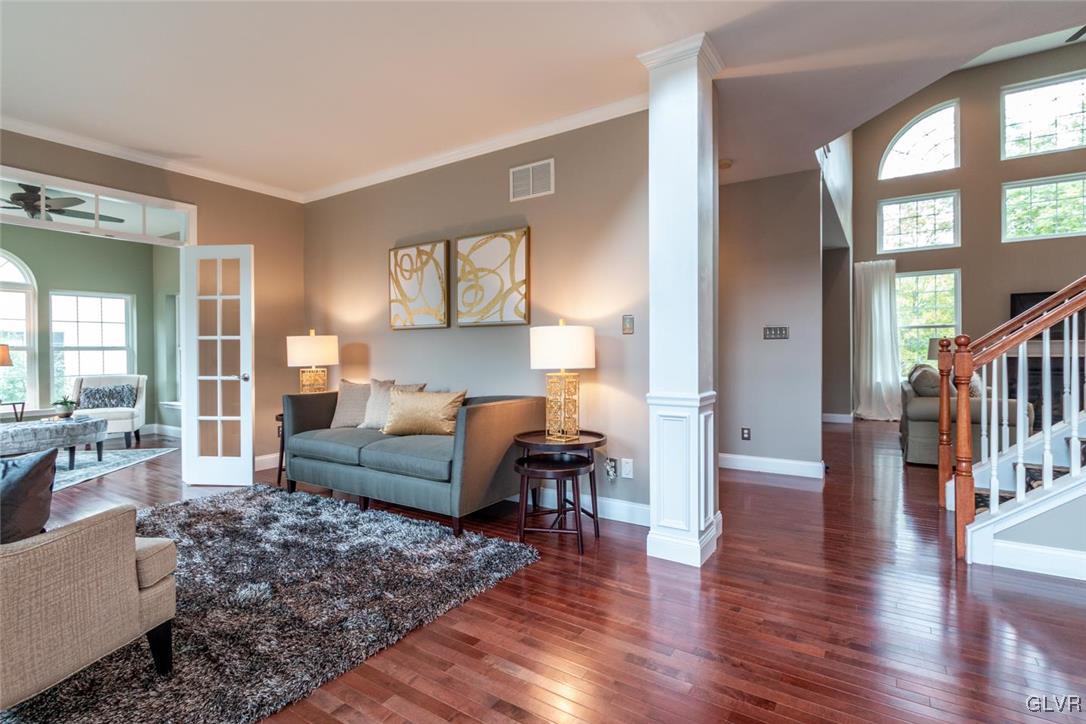 3153 Olympic Drive Emmaus, PA 18049 - Photo 9 of 40 a living room with furniture and a wooden floor