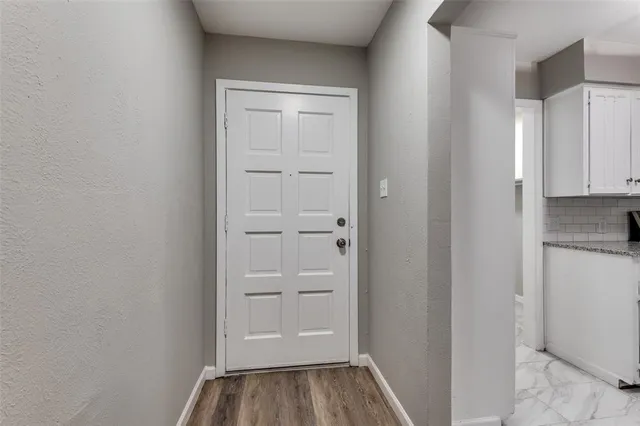 a house with a tree in front of it