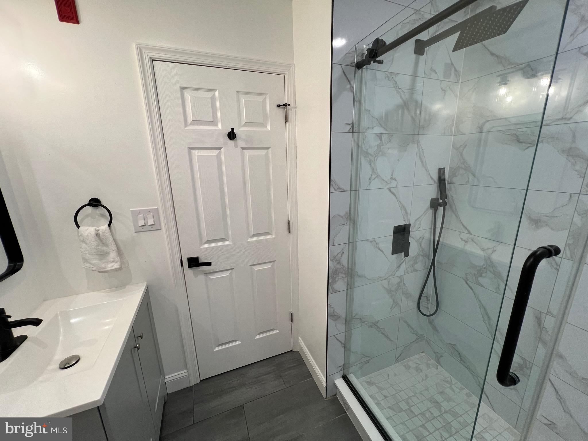 1985 North 63rd Street, Unit 2 Philadelphia, PA 19151 - Photo 13 of 23 a bathroom with a shower