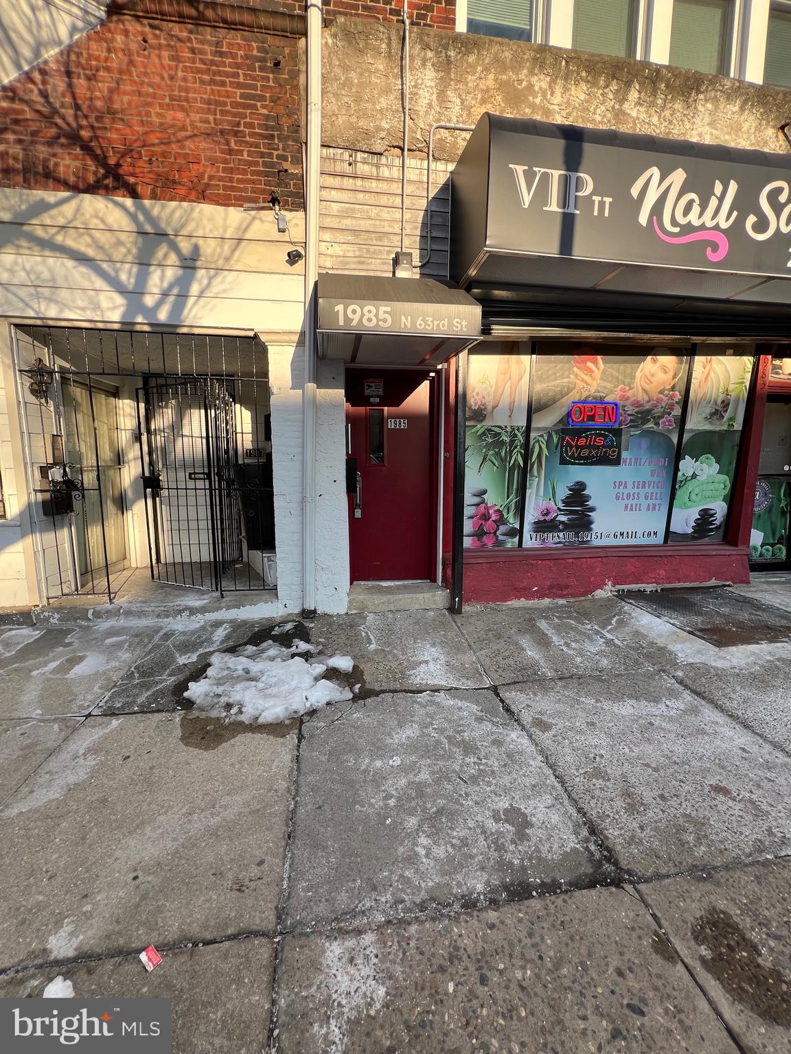 1985 North 63rd Street, Unit 2 Philadelphia, PA 19151 - Photo 23 of 23 a view of a brick building with large windows