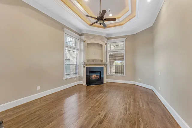 a view of room with furniture and windows