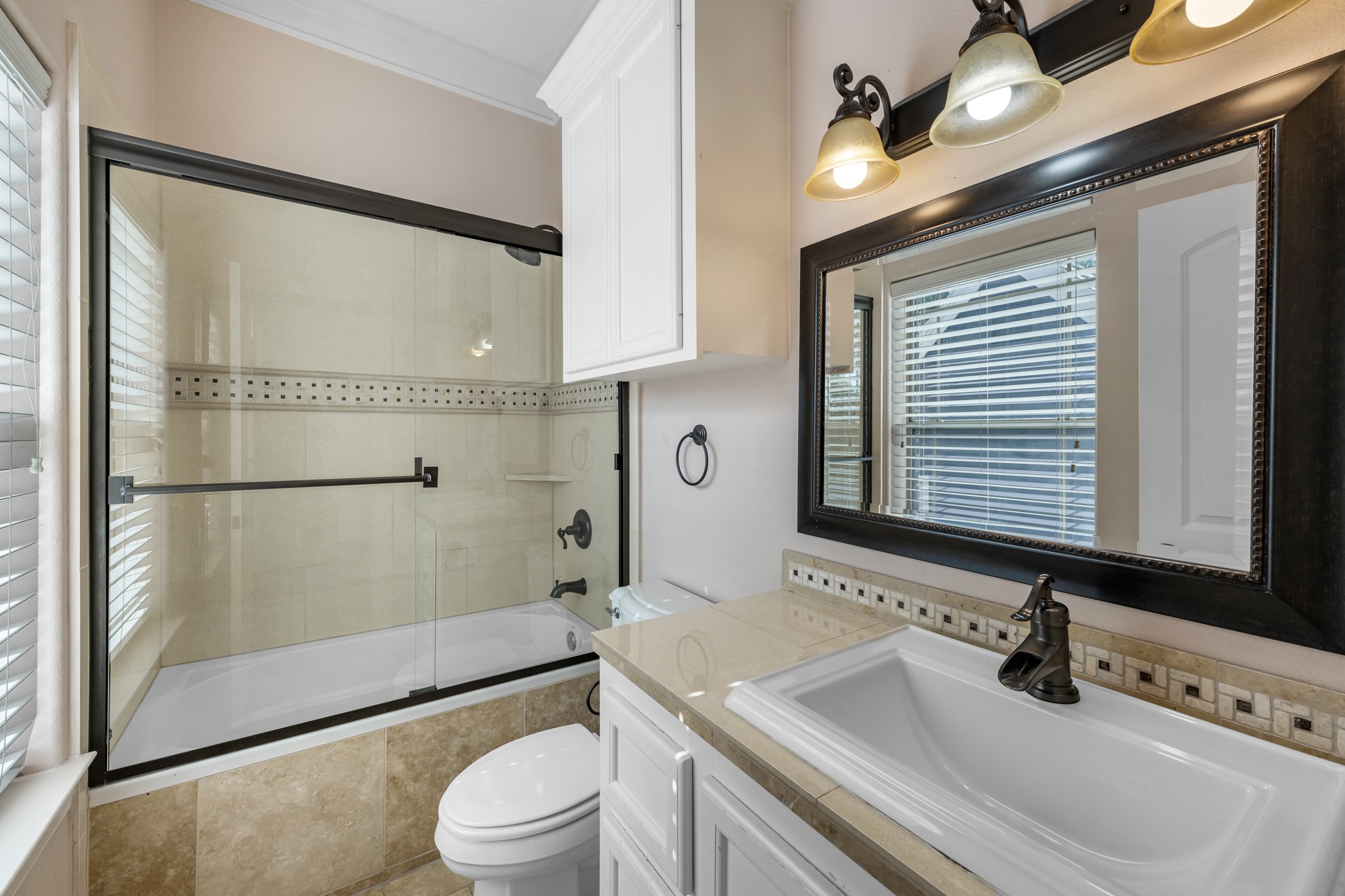 5411 Leopold Drive Houston, TX 77021 - Photo 34 of 50 a bathroom with a sink a toilet and shower