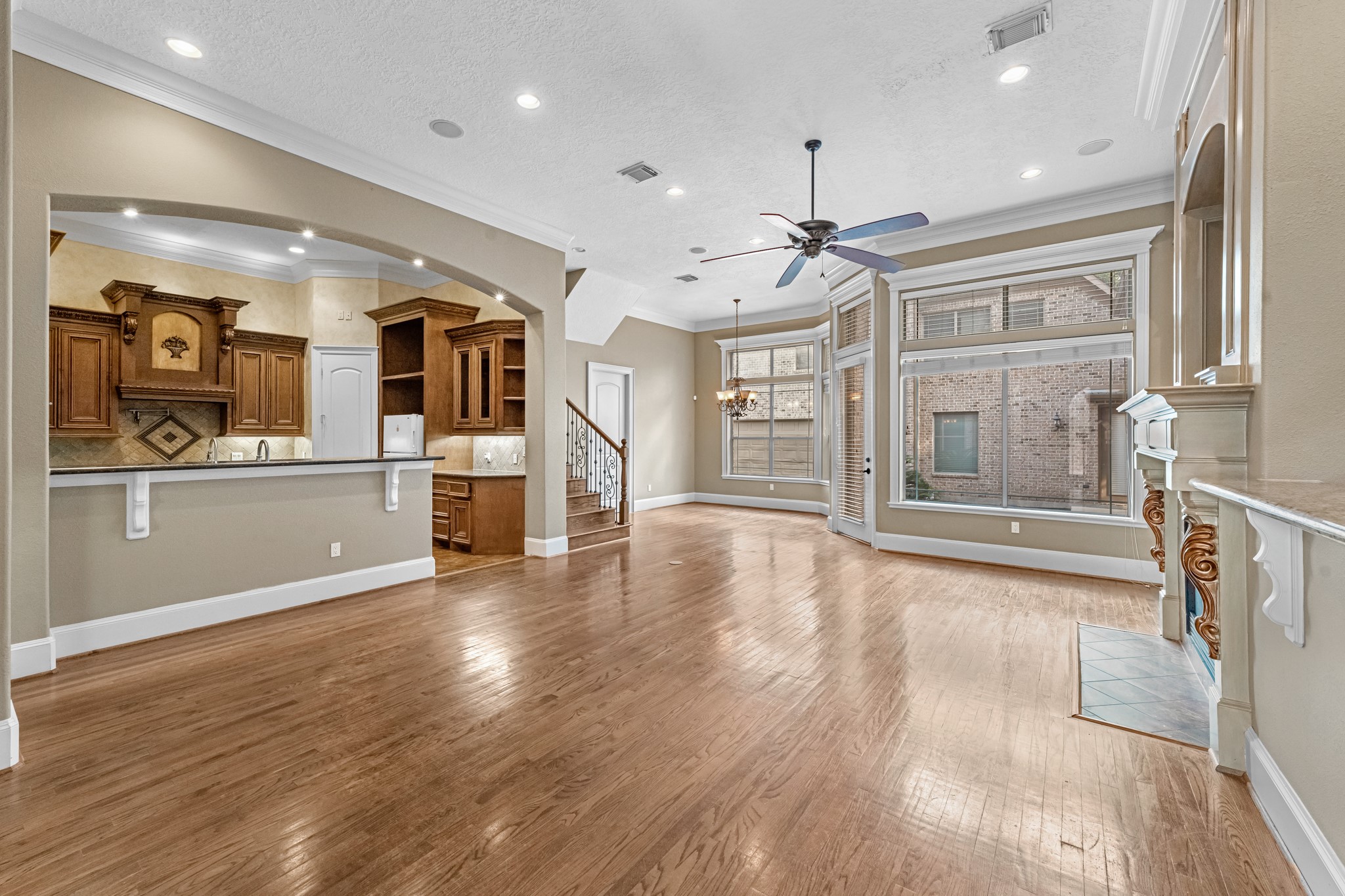 5411 Leopold Drive Houston, TX 77021 - Photo 50 of 50 a view of a big room with wooden floor and windows