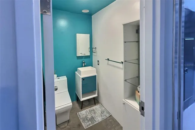 a balcony with view of outdoor space