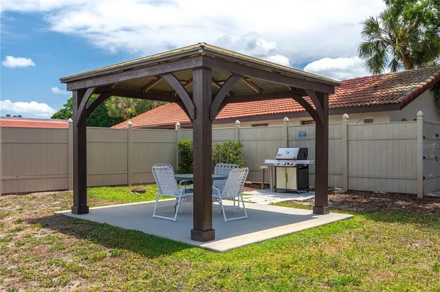 a view of a porch with furniture