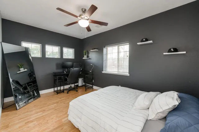 a view of a house with backyard and porch