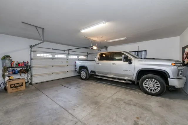 an aerial view of a house with a lake view