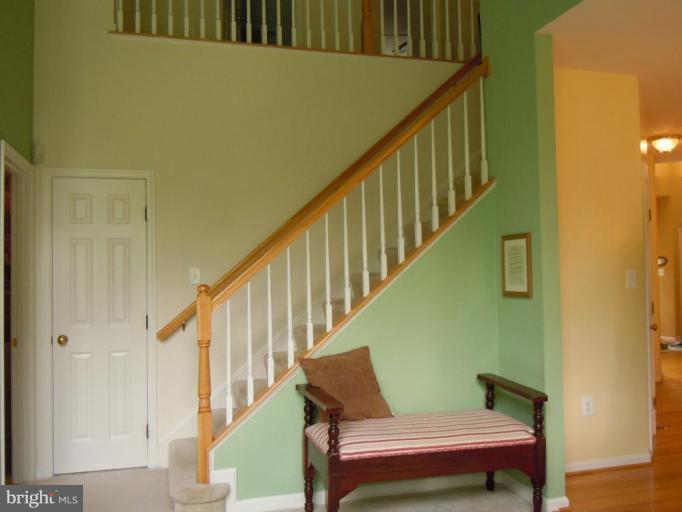 6732 Newington Road Lorton, VA 22079 - Photo 10 of 30 Back Staircase to 2nd Level