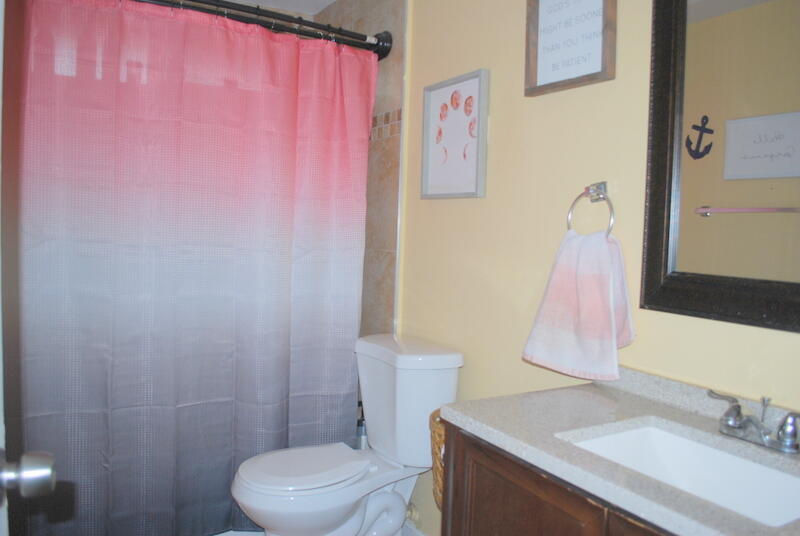 44561 Windsor Drive Indio, CA 92201 - Photo 16 of 22 a bathroom with a sink a toilet and a mirror
