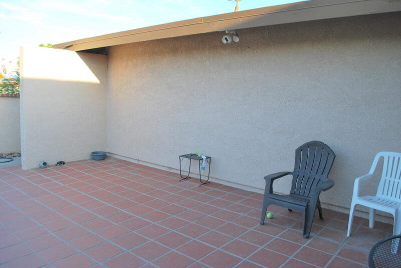 44561 Windsor Drive Indio, CA 92201 - Photo 4 of 22 a room with a chair and a table