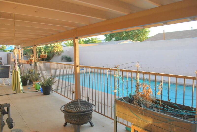 44561 Windsor Drive Indio, CA 92201 - Photo 6 of 22 a garden view with a seating space